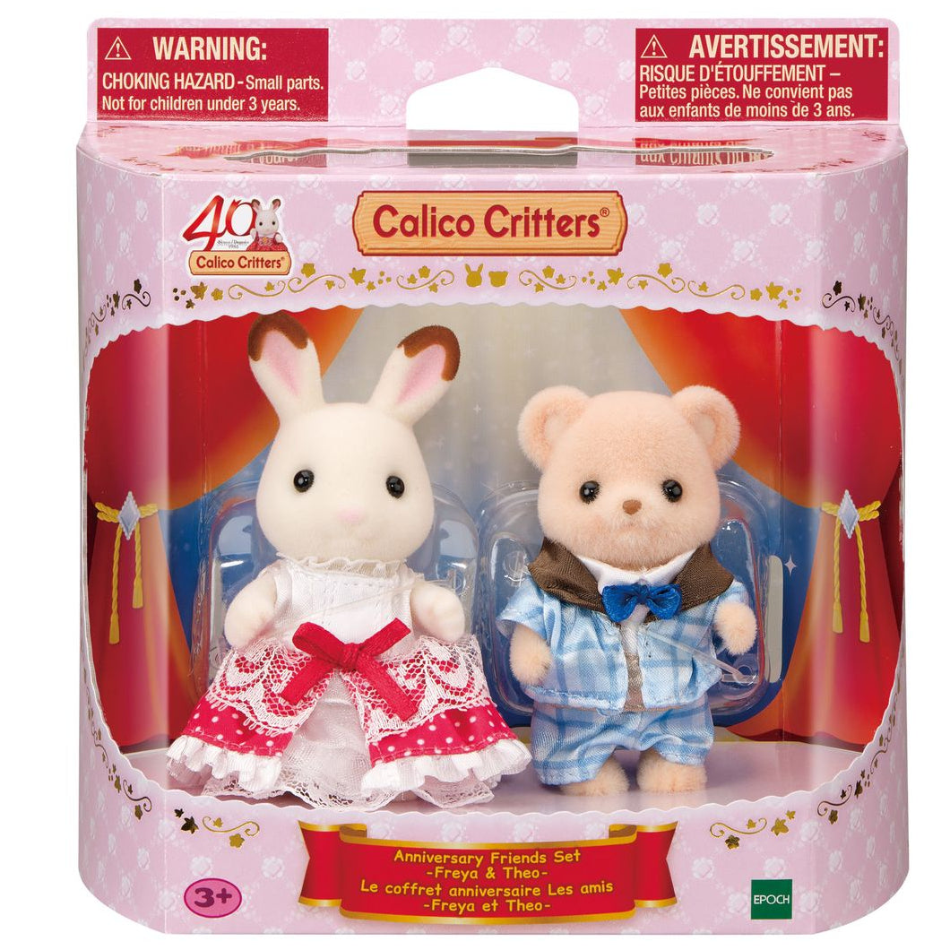The Calico Critters 40th Anniversary Friends - Freya & Theo set is packaged with a special edition figure of Freya Chocolate Rabbit in an exclusive original red dress and Theo the beige bear in a blue outfit.