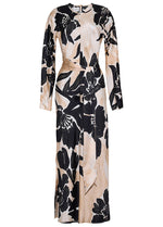 The Montgomery Silk Midi Dress by Cara Cara is a beige, long-sleeved hammered silk column dress with black oversized floral print and a front waist tie, shown against a white background.