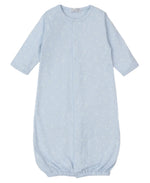 The Kissy Kissy Crescent Moonlight Printed Convertible Gown, designed by Kissy Kissy, is a charming baby gown made from soft Pima cotton. It showcases a light blue color adorned with crescent moon and star patterns. With its long sleeves and gathered bottom hem, this baby garment combines both comfort and style seamlessly.