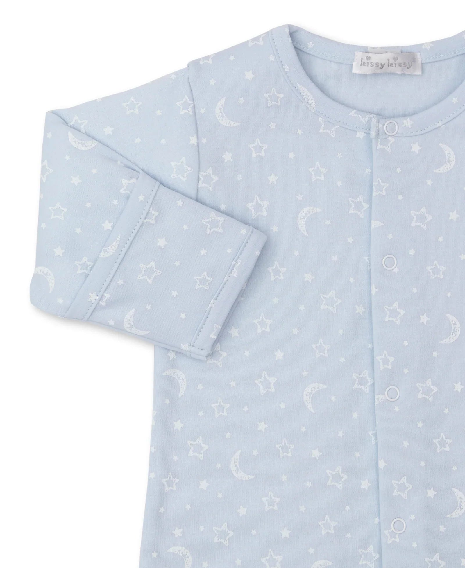 Crafted from soft Pima cotton, the Kissy Kissy Crescent Moonlight Printed Convertible Gown is adorned with a charming pattern of white stars and moons against a light blue background. This piece features long sleeves and a convenient front snap closure, providing cozy comfort while merging style with practicality—an essential in baby clothing by Kissy Kissy.