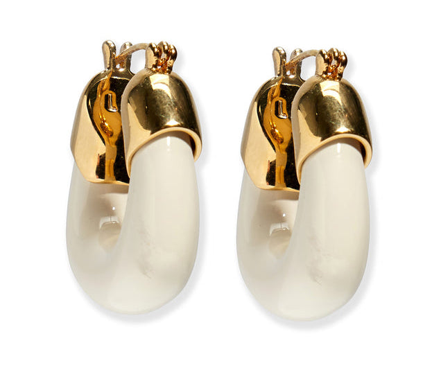 Lizzie Fortunato Organic Mini Gold Hoops feature thick, curved white resin hoops and gold-toned metal tops, creating stylish, gold-plated mini hoop earrings.