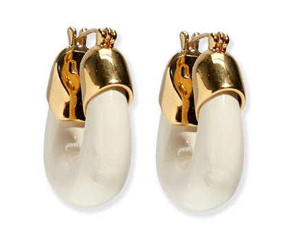 Lizzie Fortunato Organic Mini Gold Hoops feature thick, curved white resin hoops and gold-toned metal tops, creating stylish, gold-plated mini hoop earrings.