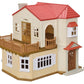 The Calico Critters Red Roof Country Home Gift Set is a plastic dollhouse playset featuring a red roof, brown balcony, white windows, and a small mailbox by the front door—perfect for recreating your favorite Sylvanian Families scenes.