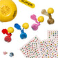 The Self Care Nail Kit by Super Smalls features colorful nail polishes with yellow caps, peel-off polish, nail stickers, two fun rings, and a yellow "SUPER" dome—perfect for creating your own at-home nail salon.