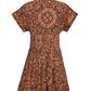 The Cara Cara Nash Mini Dress features short sleeves and a brown fit-and-flare silhouette adorned with paisley and mandala patterns, shown from the back to highlight its fitted waist, flared skirt, and convenient side seam pockets.
