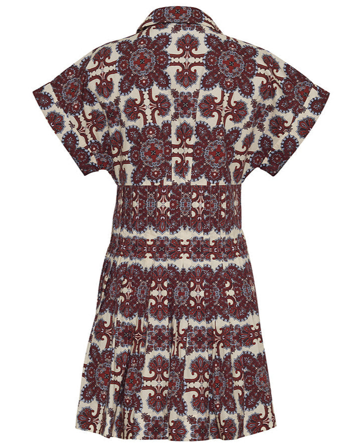 The Nash Mini Dress by Cara Cara is a short-sleeved mini shirtdress with an intricate maroon, blue, and white floral pattern, a gathered waist, pleated skirt, fit-and-flare silhouette, and collared neckline, shown from the back.