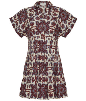The Cara Cara Nash Mini Dress is a short-sleeve collared mini shirtdress with a brown, maroon, and blue paisley print on cream, featuring a pleated skirt and button front for an ideal fit.