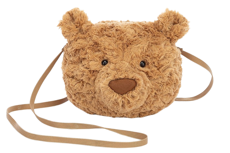 The Jellycat Bartholomew Bear Bag is a small, brown cross-body bag designed to look like a bear’s face, featuring round ears, button eyes, and a fabric nose.