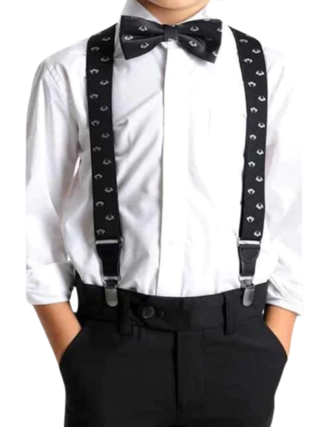 A person wearing an Appaman Boys' Standard Shirt, complemented by black suspenders and a bow tie, stands confidently with hands in pockets.