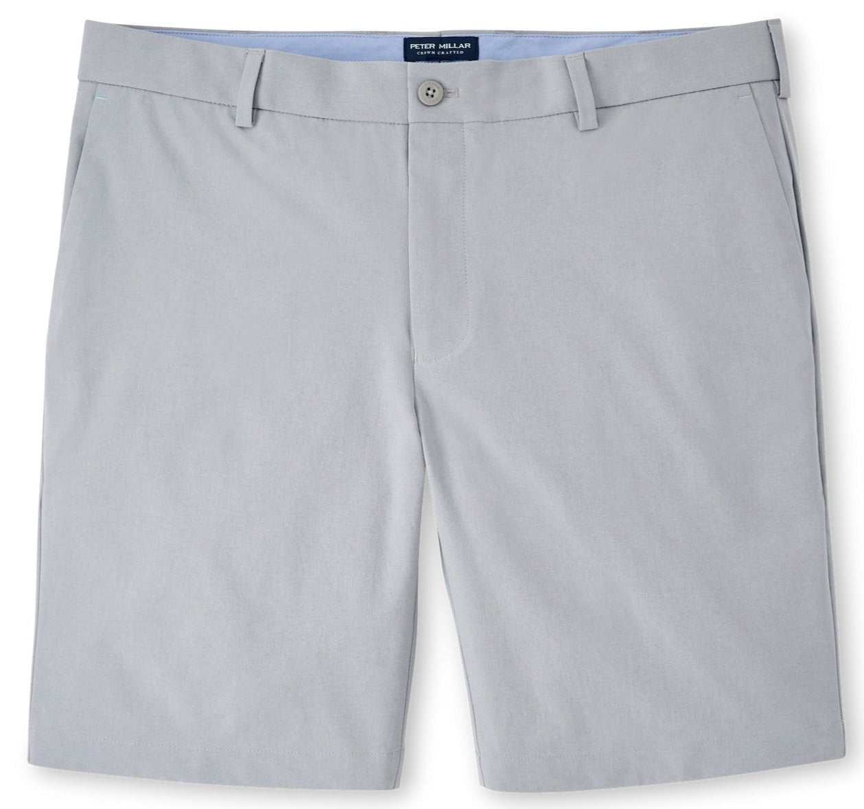 A pair of Peter Millar Surge Performance Shorts, light gray men's shorts with four-way stretch displayed against a white background.