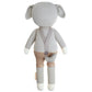 Noah the Dog - Little 13" by Cuddle + Kind is a knitted plush toy with upright ears and a short tail, dressed in neutral suspenders and pants. This adorable stuffed animal is perfect for imaginative play.