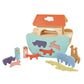 The Tender Leaf Little Noah's Ark, crafted by Tender Leaf Toys, is a delightful wooden toy set that includes a shape-sorting ark with a red roof and an array of colorful animals like elephants, giraffes, and a hippopotamus. The set is completed with two human figures to enrich the charming collection.