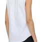 A person is wearing the Olympia Sleeveless Top by Callas Milano, a white blouse paired with black pants for modernist flair. Their neatly tied hair emphasizes the outfit as an essential wardrobe foundation.