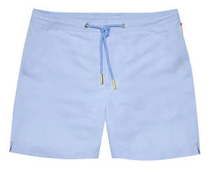 The Orlebar Brown Bulldog Drawcord Swim Short features a light blue, quick-drying fabric, gold-tipped rope-style drawcord, drawstring waist, side pockets, and small side slits at the hem.