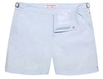 Orlebar Brown Bulldog Swim Short in Surfside Blue is shown laid flat, featuring adjustable side tabs, an open waistband with button and zipper closure, and quick-drying fabric for stylish comfort.