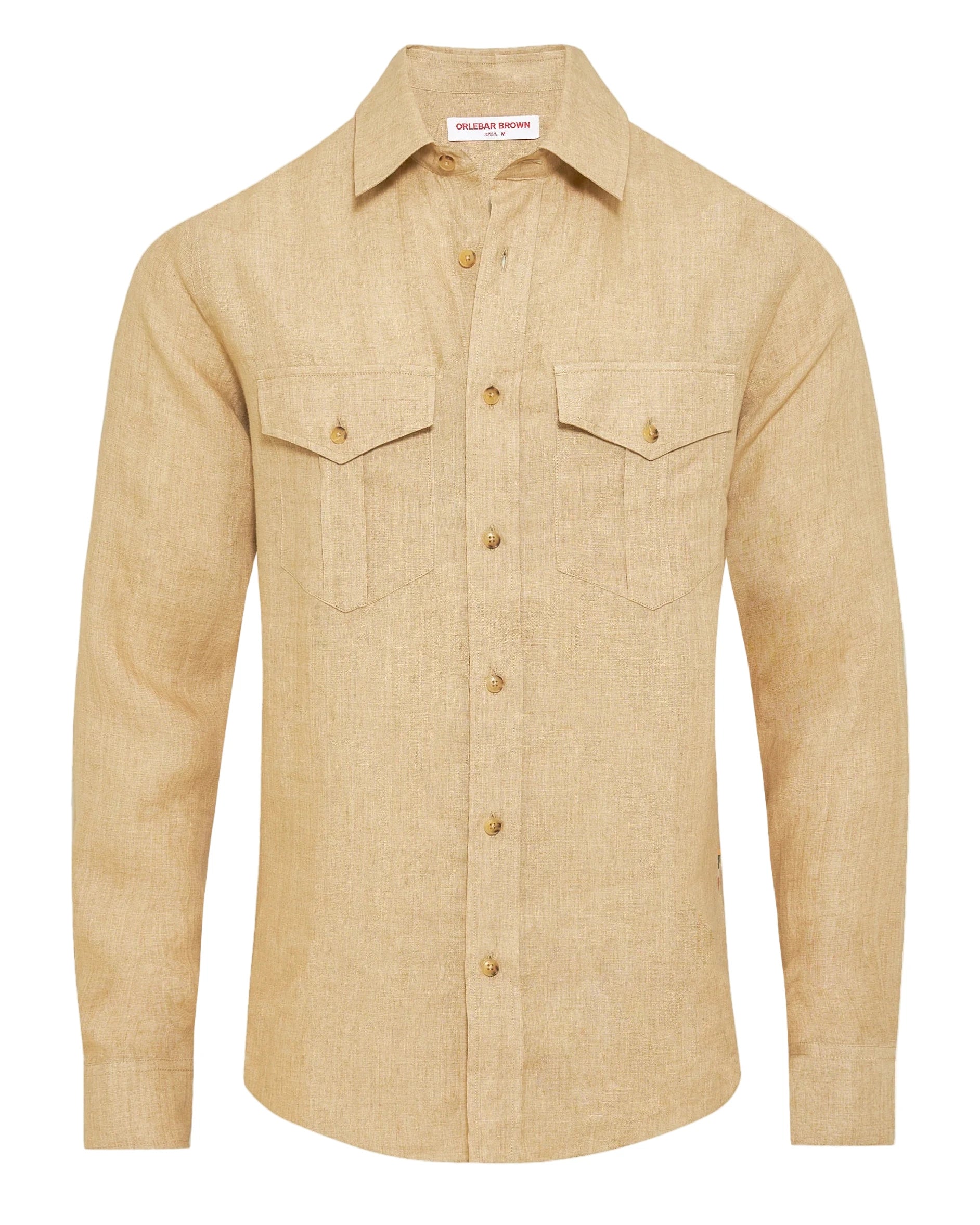 The Orlebar Brown Colburn Lino Shirt is a beige, textured linen long-sleeve button-up with two chest pockets and a collar, shown on a white background.