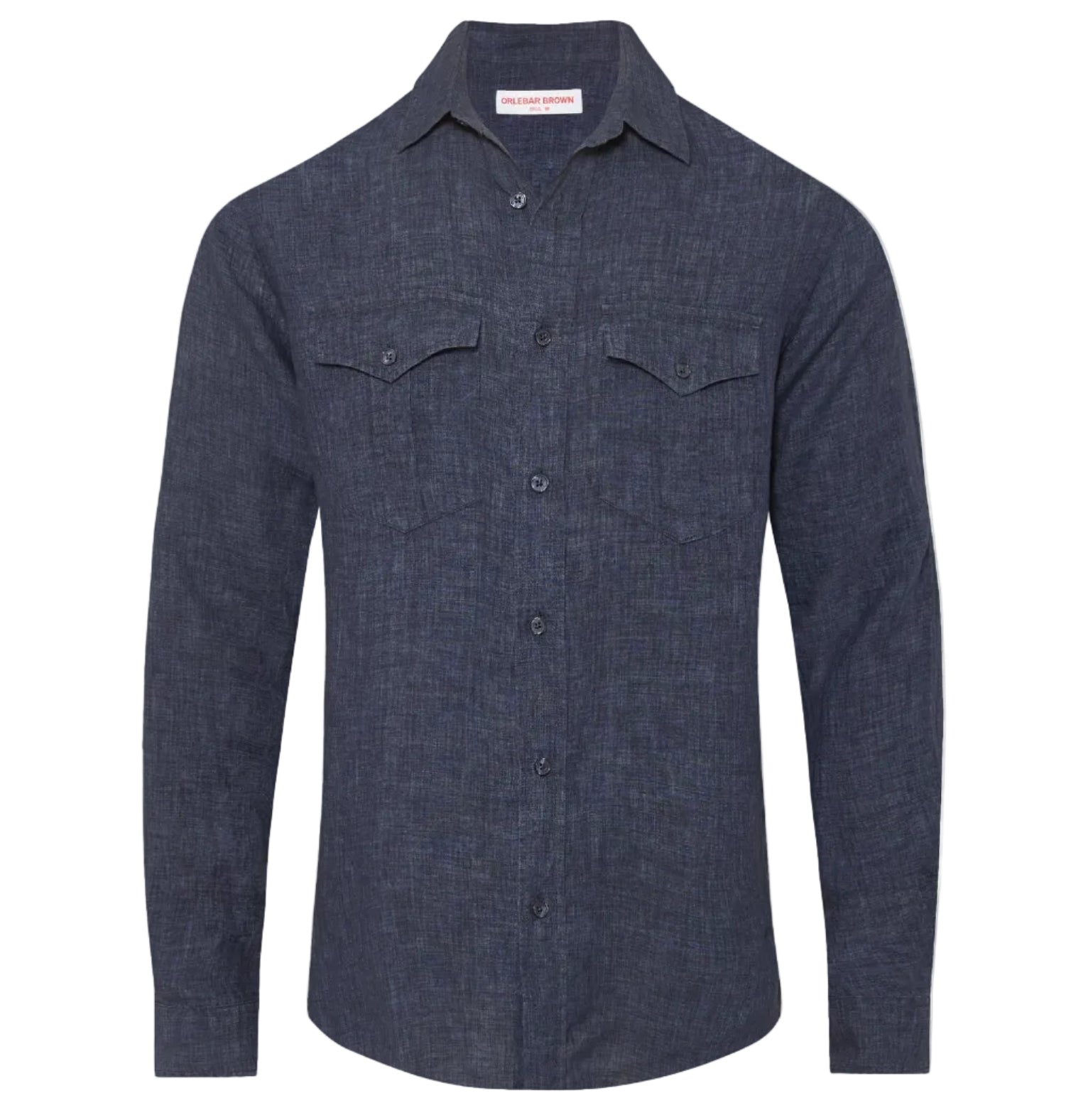 The Colburn Lino Shirt by Orlebar Brown is a tailored, long-sleeve button-up denim shirt with two chest pockets and a collar, shown against a white background.