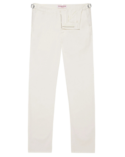 The Orlebar Brown Fallon Stretch-Cotton Pant, in off-white with a tailored fit, adjustable side tabs, and a concealed front closure, is shown laid flat on a white background.