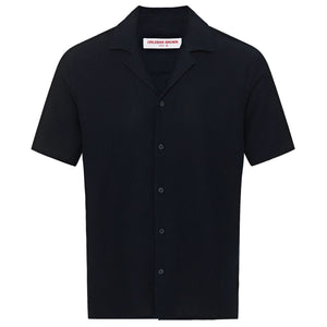 The Orlebar Brown Maitan Seersucker Woven Shirt is a short-sleeve, black Italian cotton shirt with a Capri collar, shown against a white background.