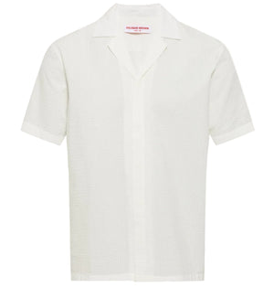 The Orlebar Brown Maitan Seersucker Woven Shirt is a white, relaxed-fit cotton shirt with short sleeves, a Capri collar, and a subtle textured pattern, shown against a plain background.