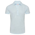 The Orlebar Brown Sebastian Linen Polo, shown on a plain white background, features a light blue color, tailored fit, short sleeves, a collar, and a three-button placket.