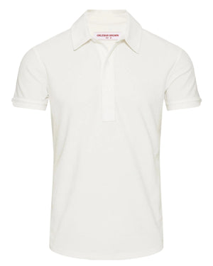 The Orlebar Brown Terry Polo features a classic collar and three-button placket, crafted from breathable cotton towelling in a tailored fit for comfort and style. Presented here in crisp white.