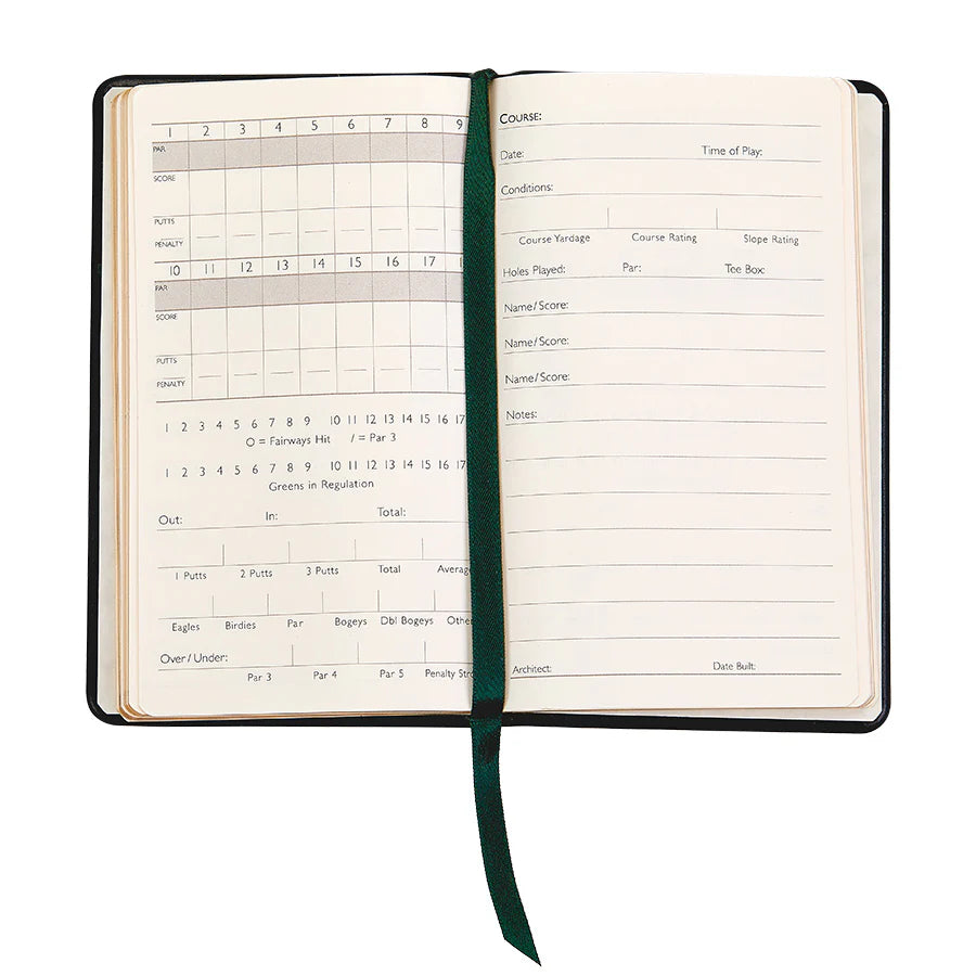 The On the Green Leather Book by Graphic Image, equipped with a green ribbon bookmark, features a grid for recording scores and spaces for course details on the right page. This compact book offers an ideal gift for golfers, combining functionality with elegance throughout its pages.