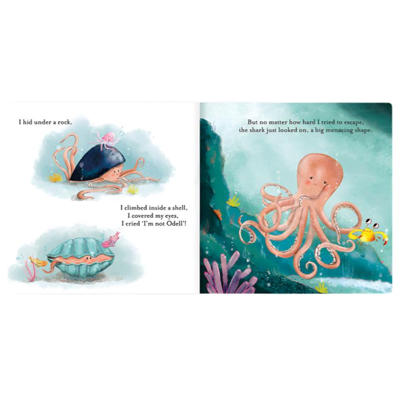 In this enchanting tale, "Jellycat The Fearless Octopus Book," the vibrant illustrations capture a pink octopus bravely hiding under a rock and inside a shell to evade a shark. Joined by a crab and various other sea creatures, the courageous octopus demonstrates its bravery in shielding its friends from danger.