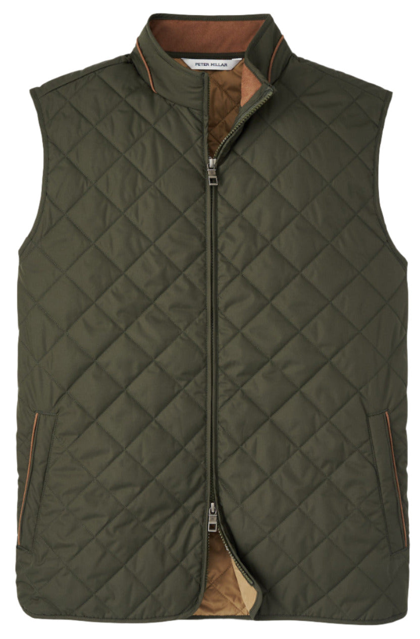 A front view of the Peter Millar Essex Quilted Travel Vest in green, showcasing its high collar, brown lining, fleece-lined interior, front pockets, and diamond-shaped stitch pattern.