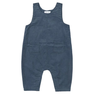 The Angel Dear Cord Navy Uni Overalls, made from 100% cotton corduroy in a fine wale design, feature shoulder straps, front pockets, and snap buttons to offer the perfect combination of style and comfort for your little one.