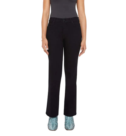 A person in a dark sleeveless top, Mother’s Lil Kick It black petite denim straight-leg pants, and light blue shoes stands with arms at their sides.