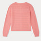 The Bonpoint Girls’ Mia Cardigan is a pink patterned knit sweater with a textured design, long sleeves, and raised cherry details, shown laid flat with the back facing up.