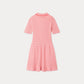 The Girls’ Marlie Dress by Bonpoint is a short-sleeved, collared pink knit dress featuring a textured pattern, displayed from the back against a plain white background.