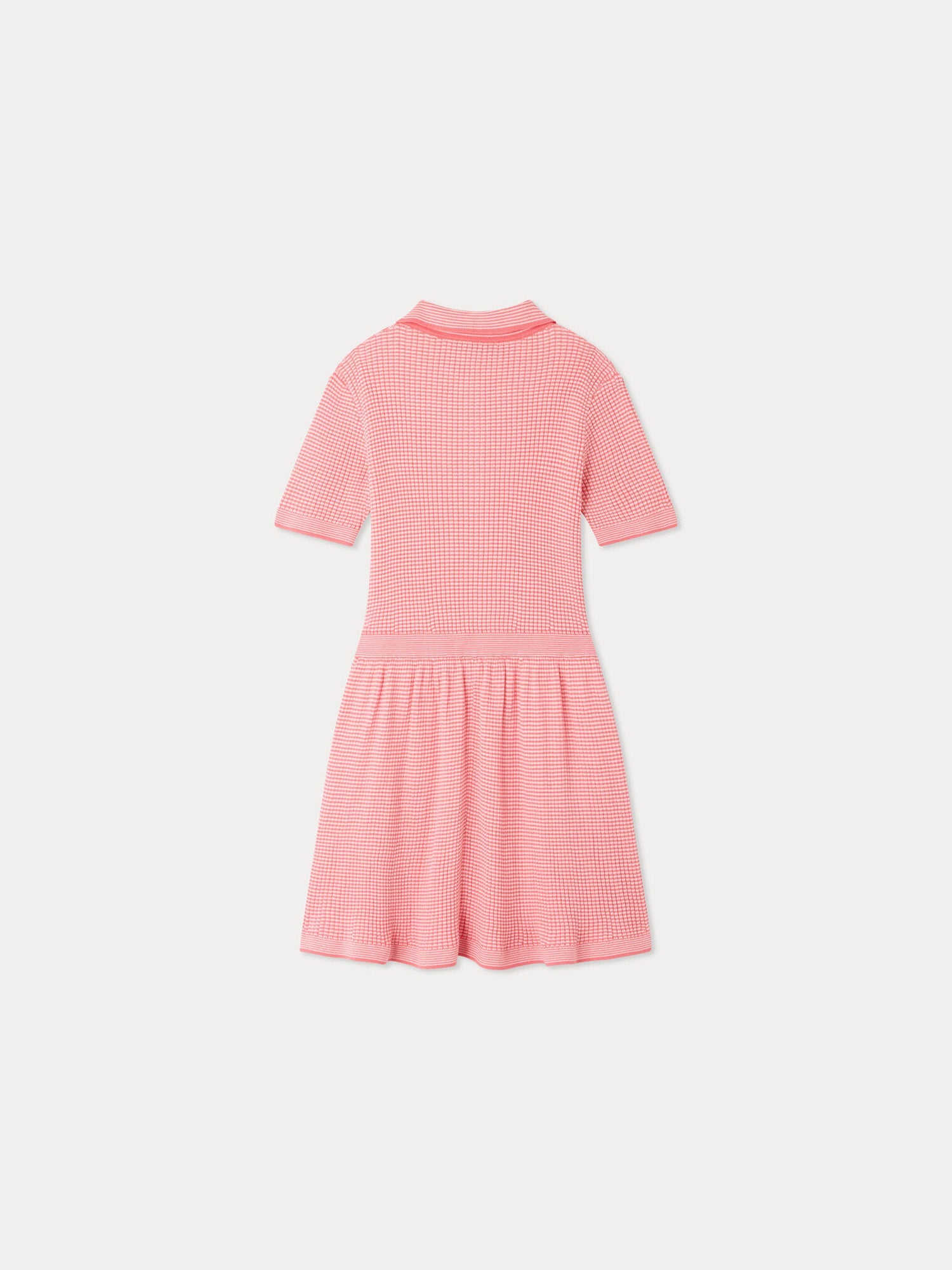 The Girls’ Marlie Dress by Bonpoint is a short-sleeved, collared pink knit dress featuring a textured pattern, displayed from the back against a plain white background.