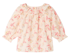 Introducing the Baby Girls’ Dolci Blouse by Bonpoint—this long-sleeved cream blouse features a cheerful pink and yellow tropical floral print, a ruffled neckline, and elasticized cuffs. Made from soft organic cotton, this charming blouse is specially designed for children and perfect for any occasion.