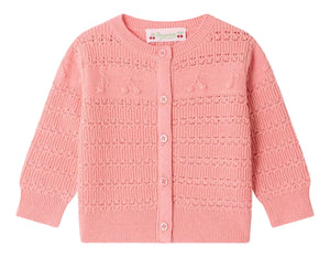 Bonpoint Baby Girls’ Mahana Cardigan in light pink, showcasing a decorative knit pattern, round neck, long sleeves, and a classic button front.