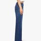 Profile view of a person wearing high-waisted, full-length Mother Petites Lil Bookie Twist Skimp denim jeans.