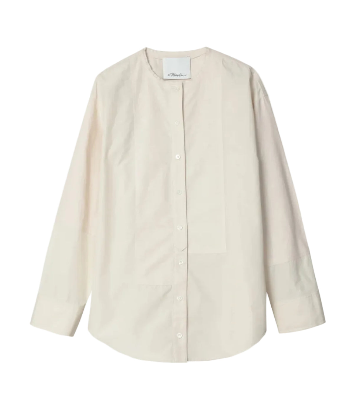 The 3.1 Phillip Lim Collarless Cotton Poplin Shirt features long sleeves and an off-white, band collar design, evoking a modernist painter’s smock, displayed laid flat on a white background.