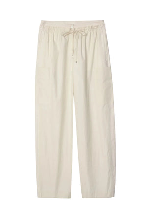 3.1 Phillip Lim Double Waistband Poplin Pants: beige, wide-leg cotton poplin pants with an elastic drawstring waist and side pockets, shown laid flat on a white background.
