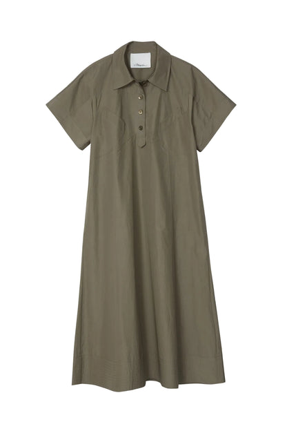 The Trapeze Midi Poplin Shirt Dress by 3.1 Phillip Lim, in khaki cotton with short sleeves, a collared neckline, buttoned placket, and relaxed fit, is laid flat on a white background.