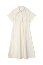 The Trapeze Midi Poplin Shirt Dress by 3.1 Phillip Lim is a cream short-sleeve, collared summer dress with chest buttons and an A-line silhouette, crafted in cotton poplin.