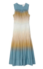 The Ombre Voile Gathered Maxi Dress by 3.1 Phillip Lim is an ankle-length, sleeveless cotton voile dress with a cinched waist and a blue, beige, and white gradient—ideal for warm weather.