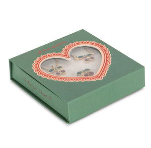 Konges Slojd Jewelery Set: A gold and purple earrings and necklace duo presented in a green gift box with a heart-shaped window.