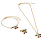 Konges Slojd Jewelery Set includes a necklace, bracelet, and ring—each with cherry charms and playful red and green enamel accents.