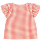 The Konges Slojd Girls' Kim Frill Shirt is a short-sleeved pink and white checkered seersucker blouse with ruffled shoulder frills, shown against a white background.