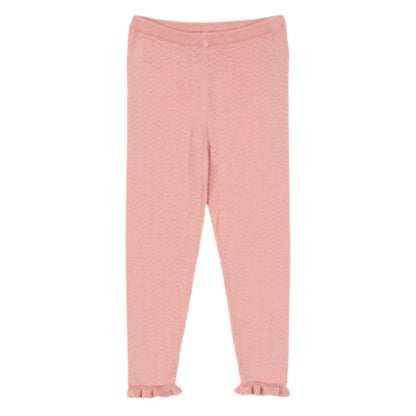 The Konges Slojd Baby Girls' and Girls' Cypres Pants feature light pink knit fabric with a subtle zigzag pattern and delicate frills at the hems, shown against a plain white background.