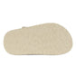 The image shows the sole of Konges Slojd's Kids' Sable Sandal, featuring an embossed pattern of waves, a sun, and a palm tree on durable light-colored EVA-base soles.