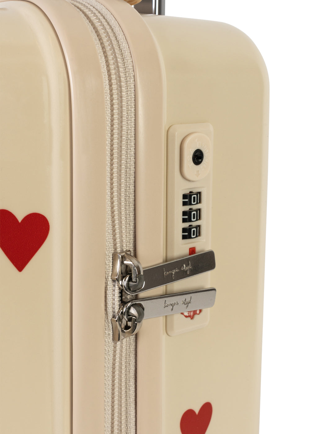 Cream-colored Kids’ Travel Suitcase by Konges Slojd featuring red heart patterns and a three-digit TSA lock.