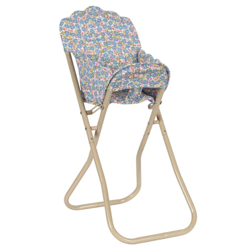 The Konges Slojd Doll High Chair is a foldable beige metal chair with a detachable seat and backrest in blue floral fabric—perfect for dolls.