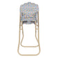 The Konges Slojd Doll High Chair is a beige, foldable chair for dolls with a detachable seat and backrest in blue floral fabric, shown from the front.
